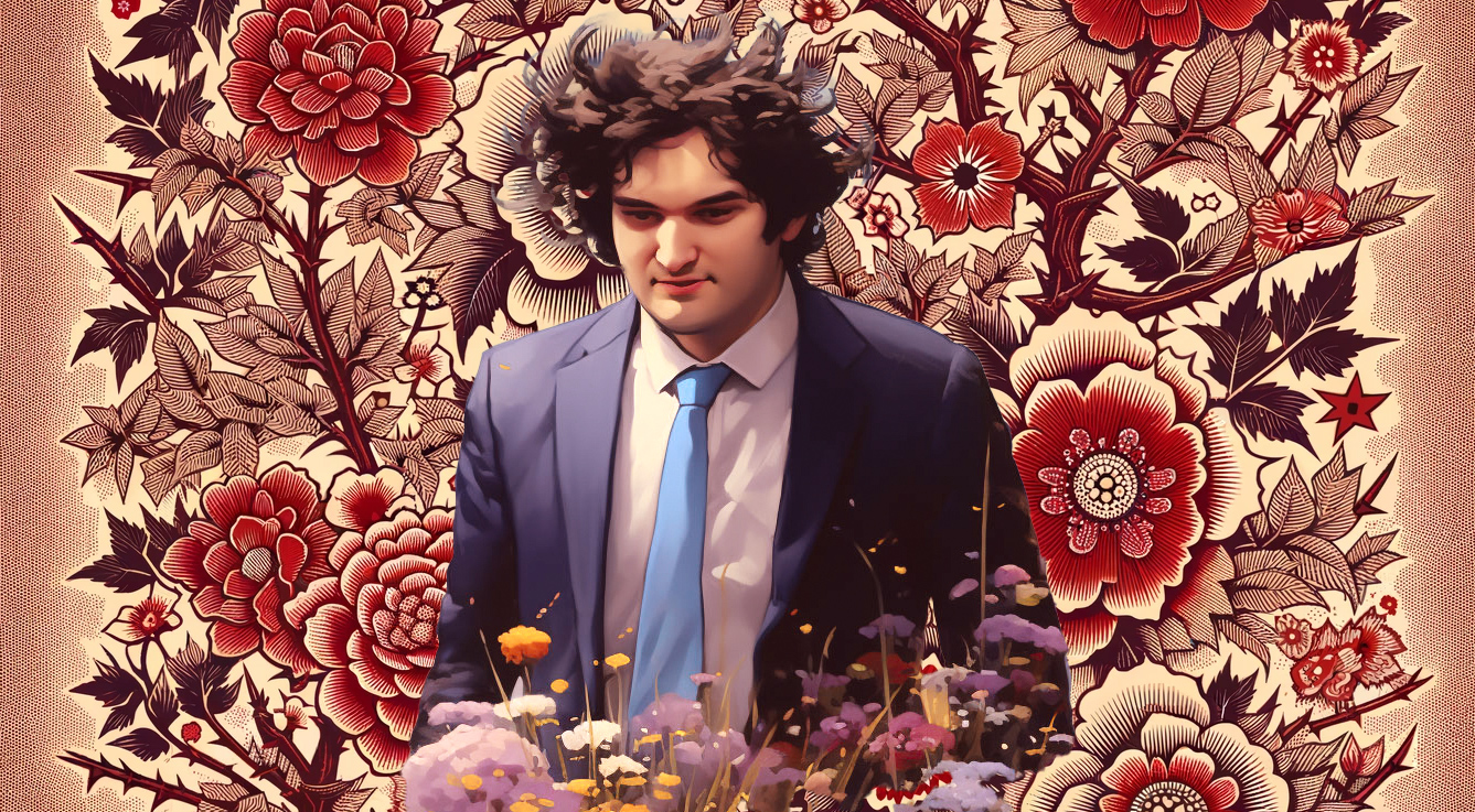 a man in a suit and tie holding flowers
